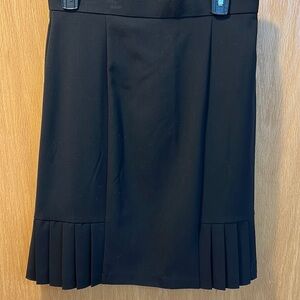 Size 8 black pleaded skirt.